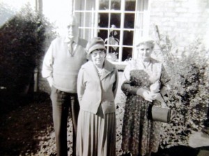 Bill Minchin, Alice Lambert, May Minchin in front garden, 12 Rissington Road, Bourton, early 1960s. Bill wearing tie, May in best frock. Why is Alice visiting from Lincolnshire? Looks like special occasion. 