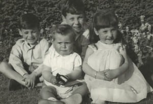 Paul, Andrew and Jayne with Nicky holding a toy gun at the front. 